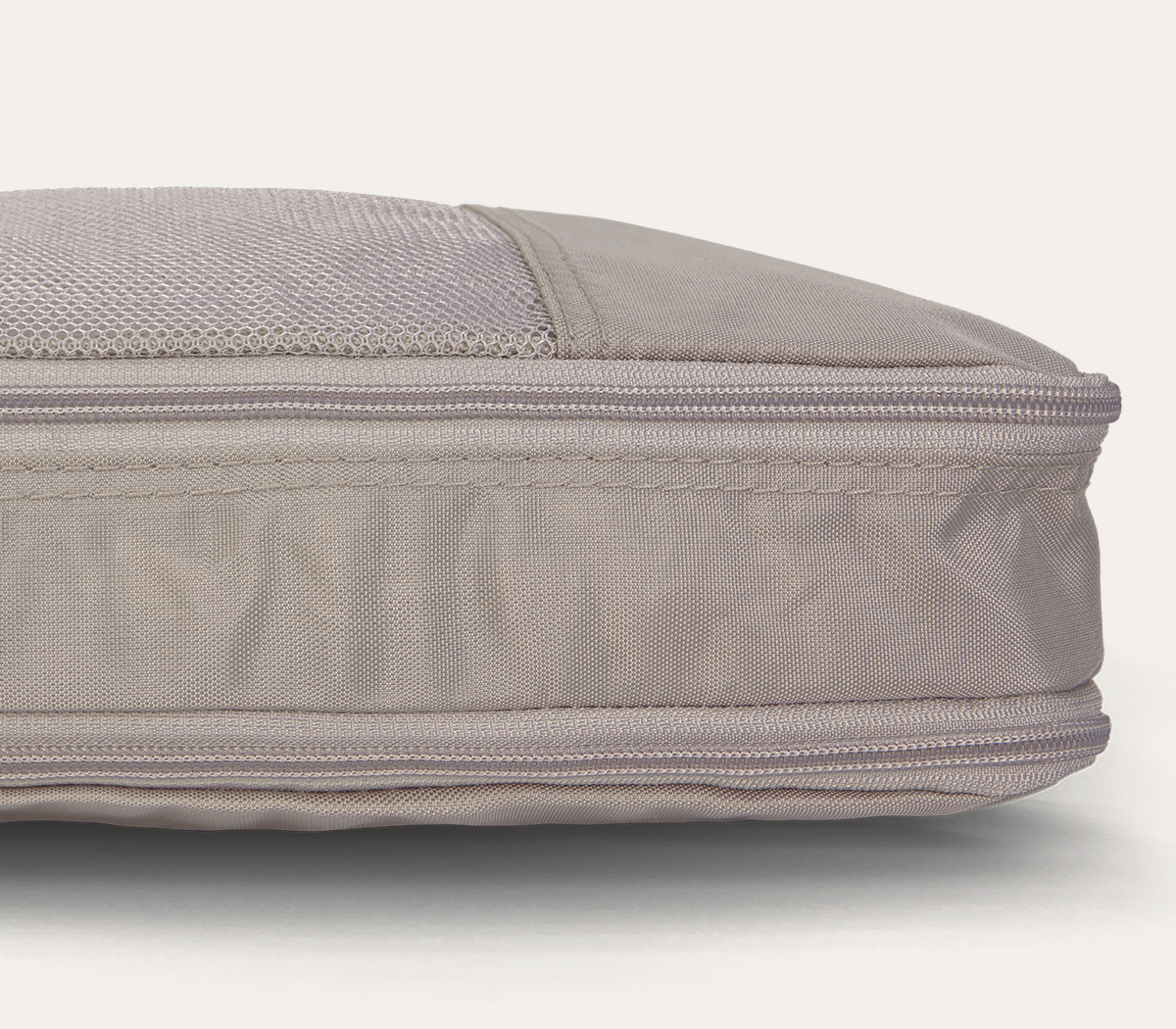 Side compression zippers for additional 3” of packing space
